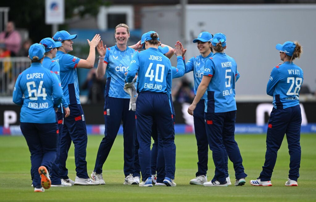 Women’s international cricket match in England stadium with crowd
