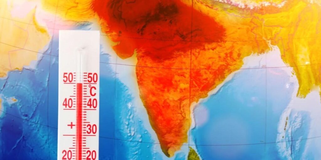 People walking during intense heatwave conditions in India