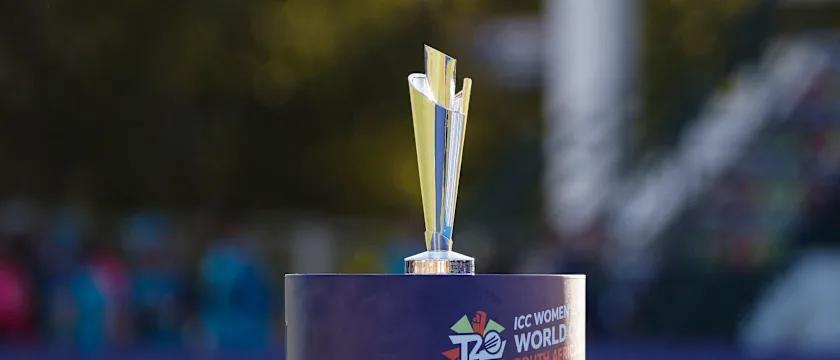 ICC Women’s T20 World Cup trophy placed on podium with blurred stadium background