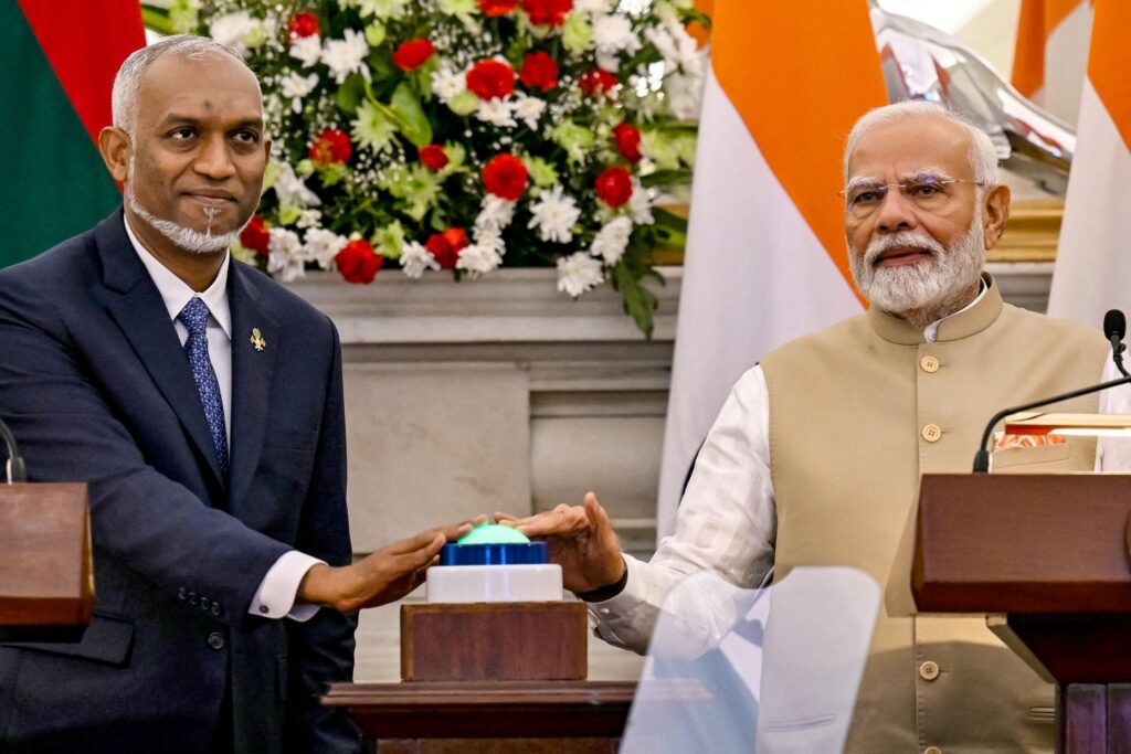 India and Maldives leaders with Indian Ocean geopolitical background during announcement of SAARC currency swap support.