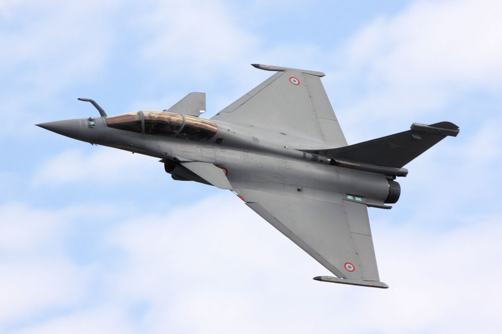 Rafale fighter jet in flight showcasing advanced weapons and combat capabilities