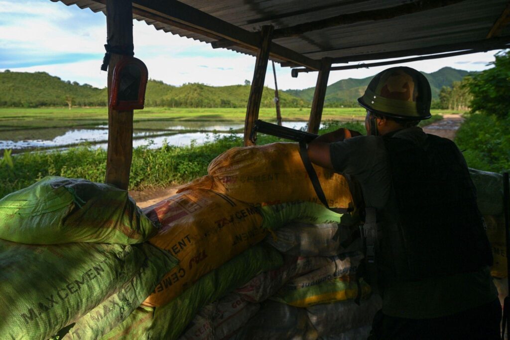 Indian security forces conducting bunker destruction operation in Manipur with explosion and smoke