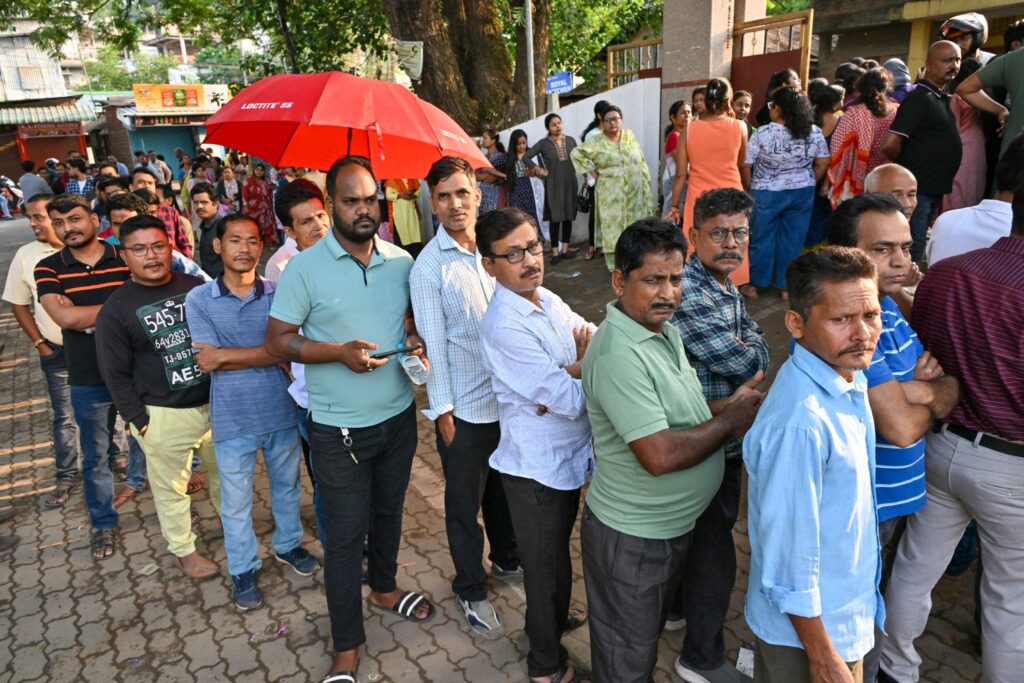 Polling Ends in Assam, Kerala and Puducherry; Results on May 4 Voters standing in queue at polling booths in Assam Kerala Puducherry elections 2026