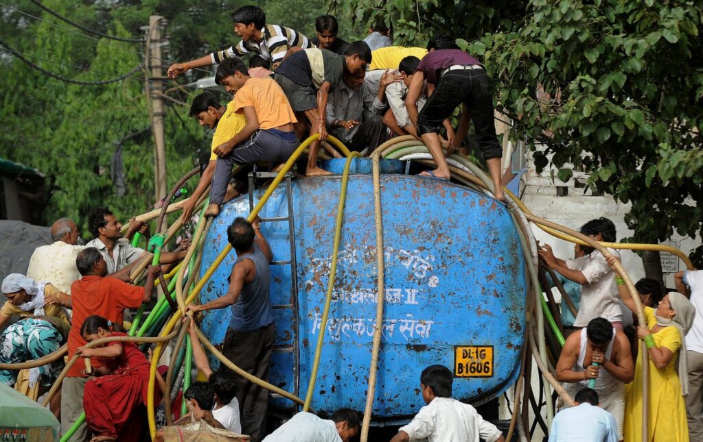 people drinking water during heatwave India staying hydrated