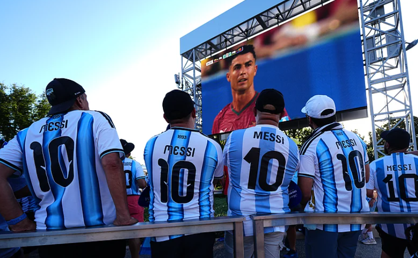 Argentina fans watch Cristiano Ronaldo on a screen during Colombia vs Portugal FIFA World Cup 2026 match coverage