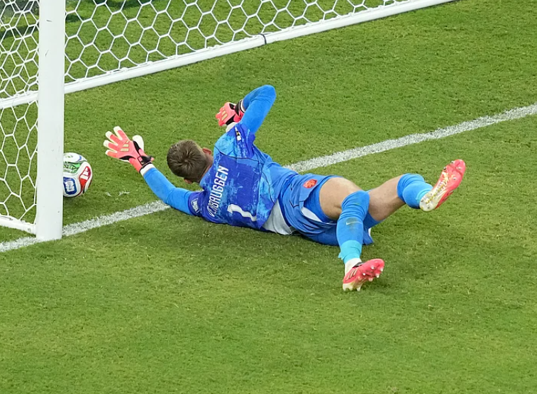 Netherlands goalkeeper Bart Verbruggen concedes during penalty shootout against Morocco in FIFA World Cup 2026 Round of 32
