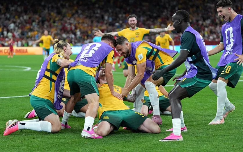 Connor Metcalfe celebrates with Australia teammates after scoring against Türkiye in FIFA World Cup 2026