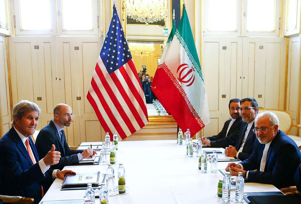 United States and Iran flags displayed during high-level diplomatic talks.