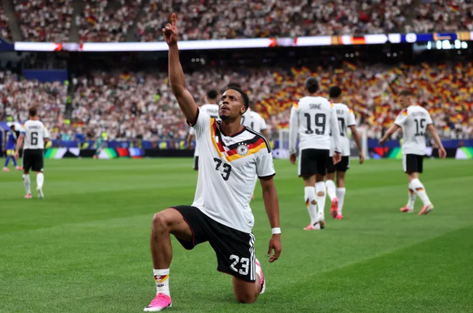 Felix Nmecha celebrates after scoring Germany