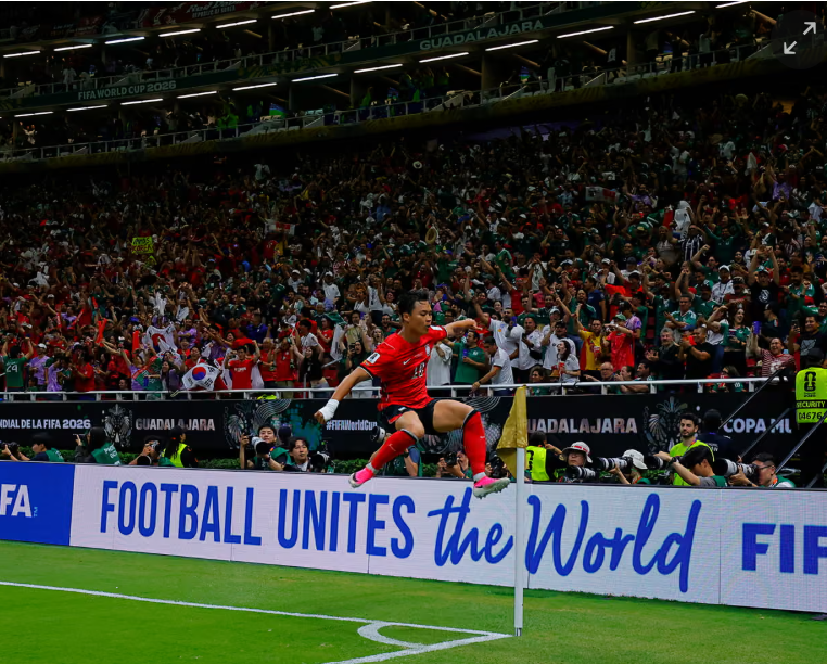 Oh Hyeon-gyu celebrates after scoring South Korea