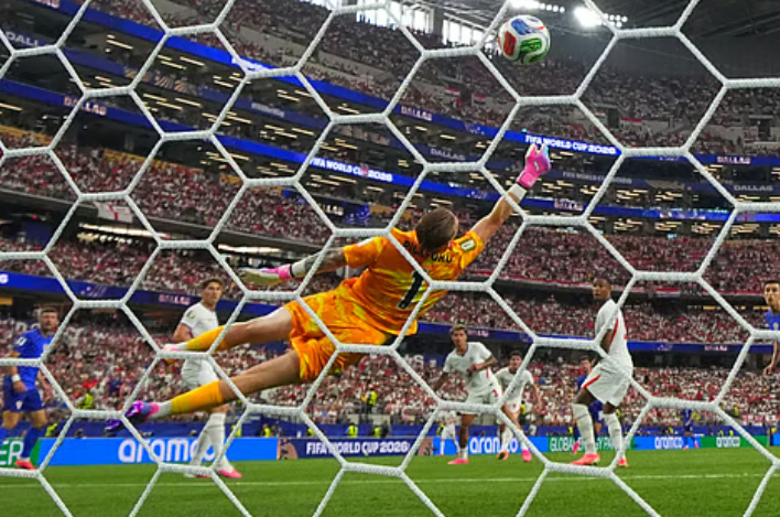 Martin Baturina scores for Croatia past England goalkeeper Jordan Pickford during FIFA World Cup 2026