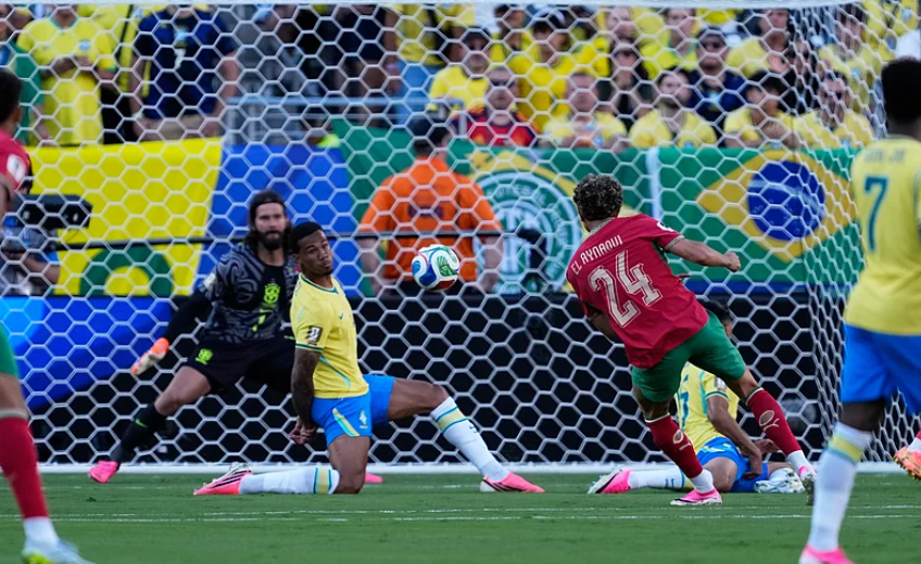 Neil El Aynaoui attempts a shot on goal for Morocco against Brazil during the FIFA World Cup 2026 Group C match