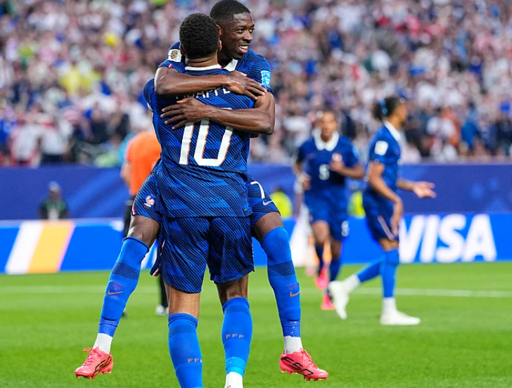 Ousmane Dembele congratulates Kylian Mbappe after France goal against Iraq