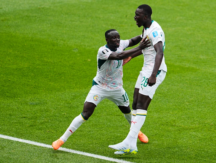 Pape Gueye celebrates with Sadio Mane after scoring for Senegal against Iraq in FIFA World Cup 2026