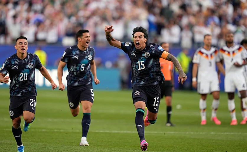 Paraguay players celebrate after defeating Germany in the FIFA World Cup 2026 Round of 32 penalty shootout in Foxborough