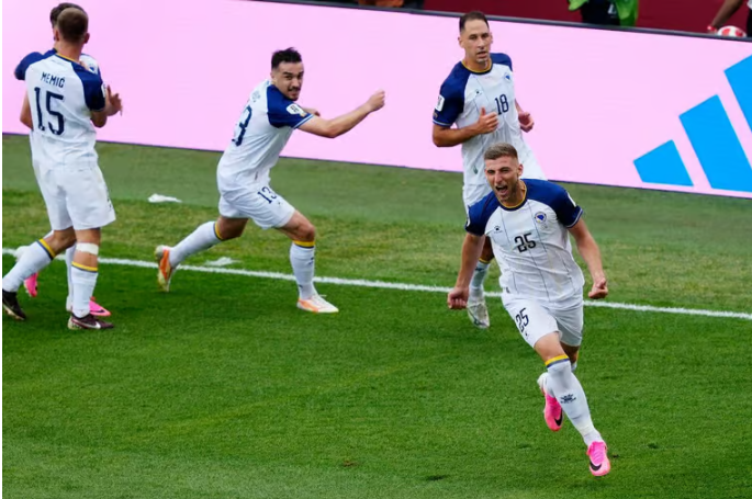 Jovo Lukić celebrates after scoring Bosnia and Herzegovina