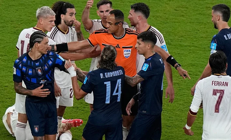 Spain and Uruguay players argue during FIFA World Cup 2026 Group H match