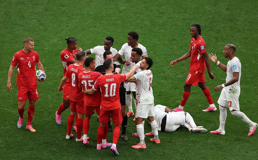 Canada and Switzerland players involved in a heated confrontation