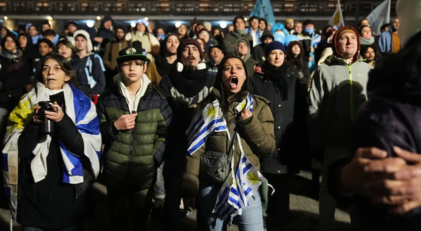 Uruguay fans react while watching the FIFA World Cup 2026 match against Saudi Arabia in Montevideo