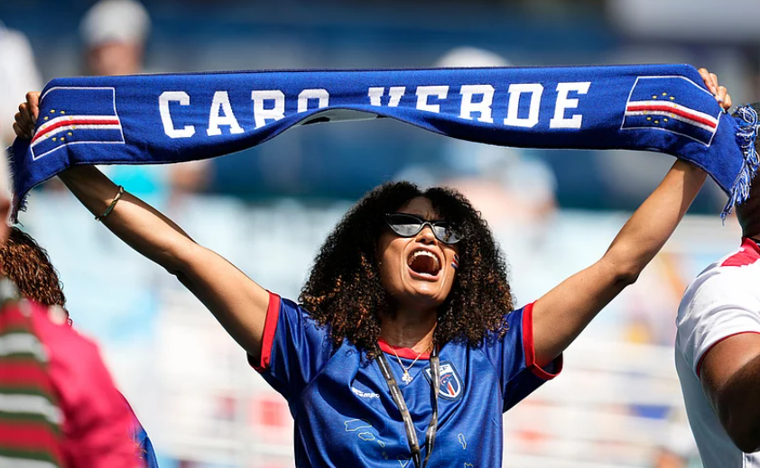 Cape Verde supporter raises a Cabo Verde scarf during the FIFA World Cup 2026 Round of 32 match against Argentina