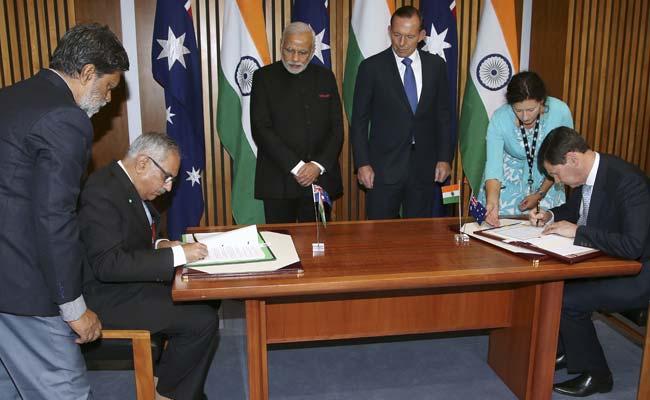 India and Australia sign a civil nuclear cooperation agreement after Canberra reversed its uranium export policy