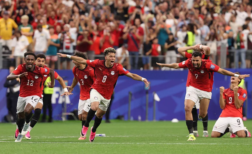 Egypt players celebrate after Hossam Abdelmaguid scores the winning penalty against Australia in the FIFA World Cup 2026 Round of 32