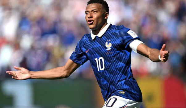 Kylian Mbappe with the 2026 FIFA World Cup Golden Boot award