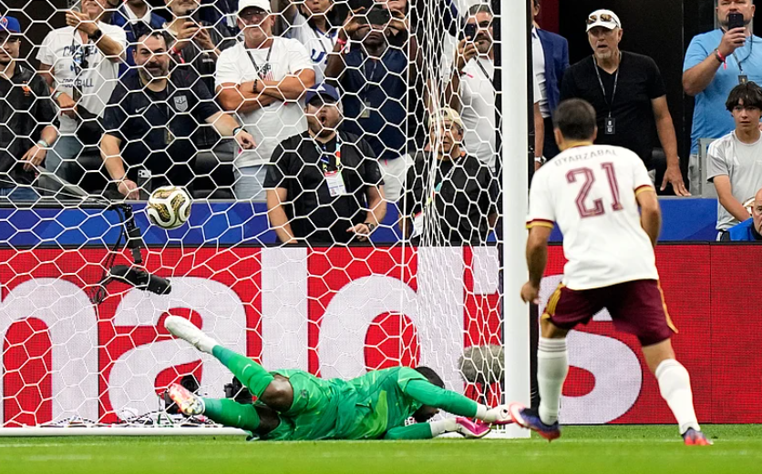Spain forward Mikel Oyarzabal scores a penalty past France goalkeeper Mike Maignan in the FIFA World Cup semifinal