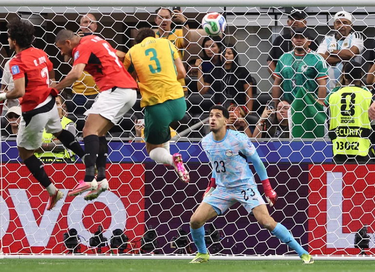 Egypt goalkeeper Mostafa Shoubir watches as Mohamed Hany scores an own goal against Australia in the FIFA World Cup 2026 Round of 32