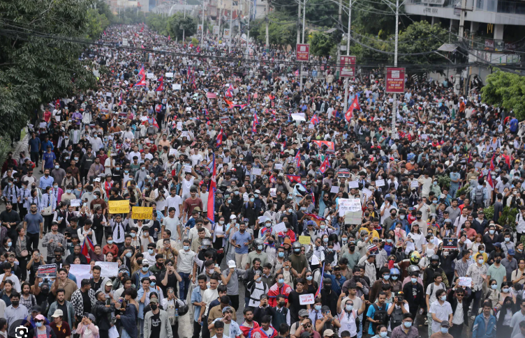A massive crowd of Gen Z protesters fills a Kathmandu street during Nepal's 2025 anti-corruption demonstrations