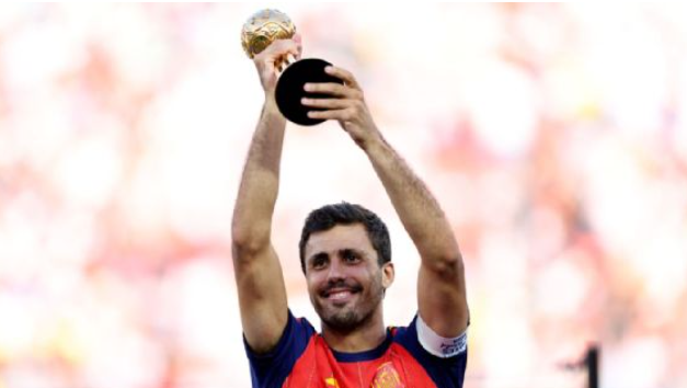 Rodri holding the 2026 FIFA World Cup Golden Ball award