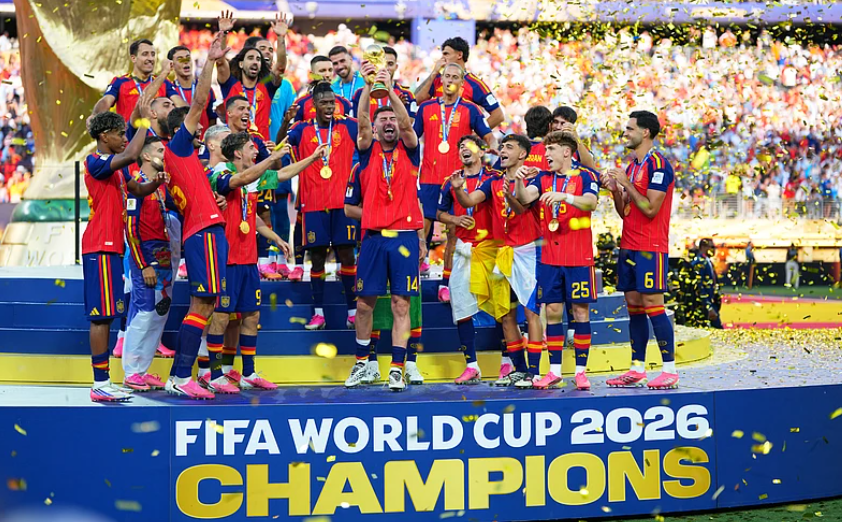 Spain players celebrate with the trophy after winning the FIFA World Cup 2026 final against Argentina