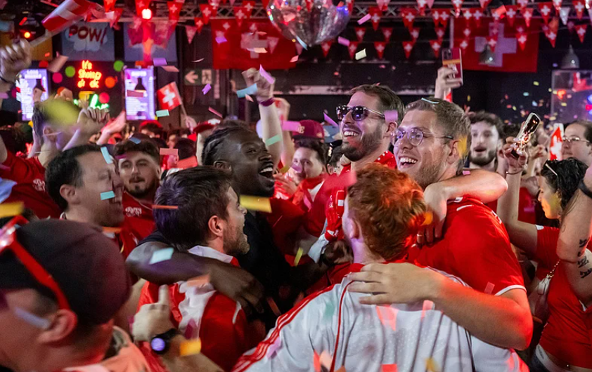 Swiss supporters celebrate during a public viewing after Switzerland beat Algeria in the FIFA World Cup 2026 Round of 32
