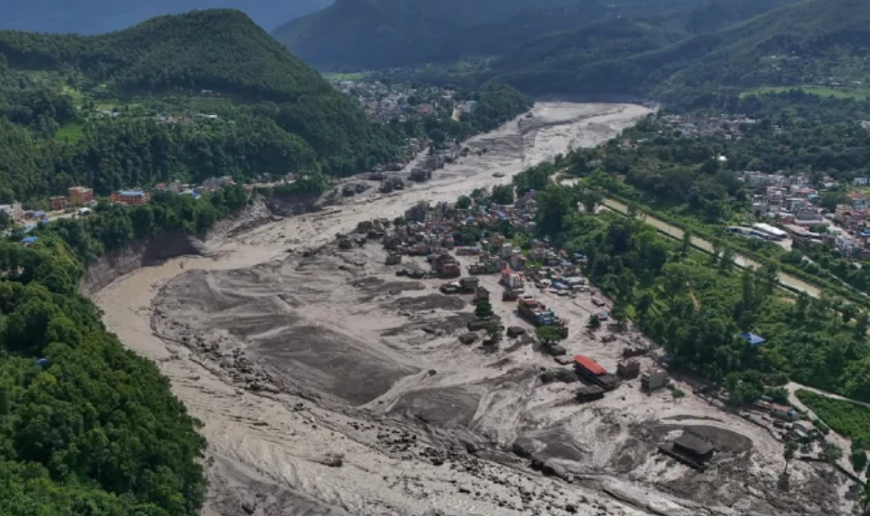 Aerial view of a Nepalese town flooded by mud and sediment after a flash flood
