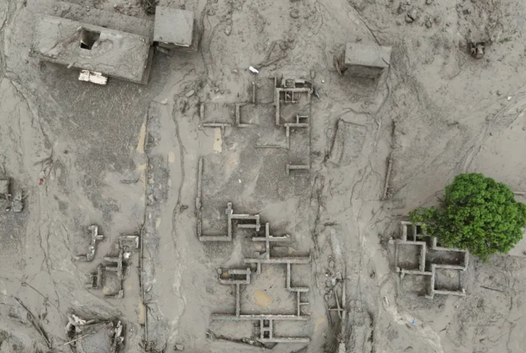 Drone view of buildings covered by mud following the Nepal flash floods