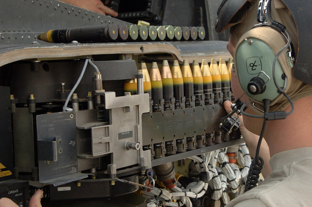 M789 HEDP 30 mm ammunition being loaded into an AH-64 Apache