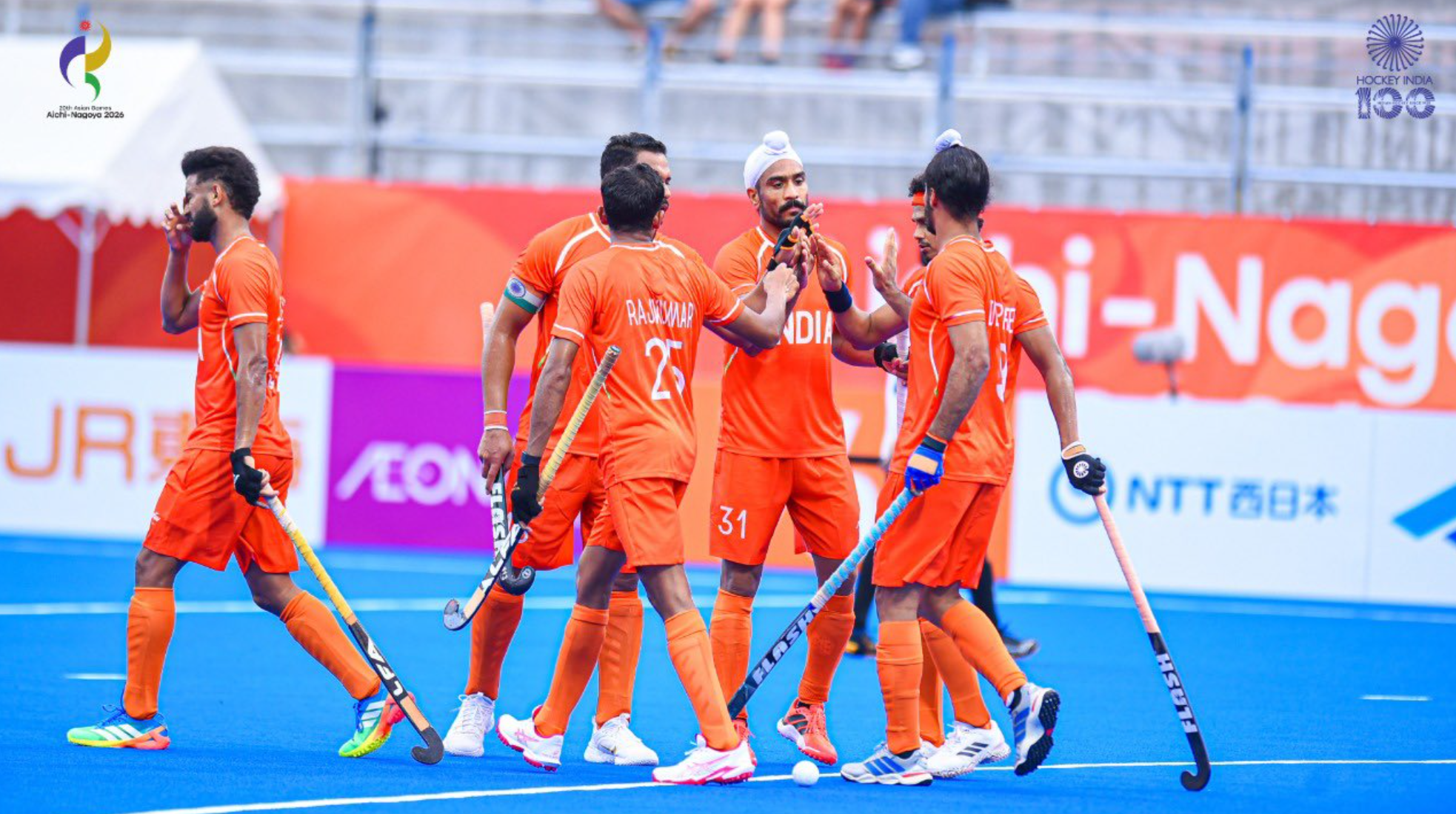India men's hockey players celebrate a goal against Indonesia at the Asian Games 2026