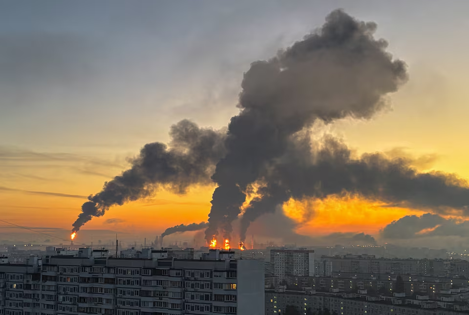 Multiple fires and thick smoke rise from a Moscow oil refinery following a reported Ukrainian drone strike on September 20, 2026.