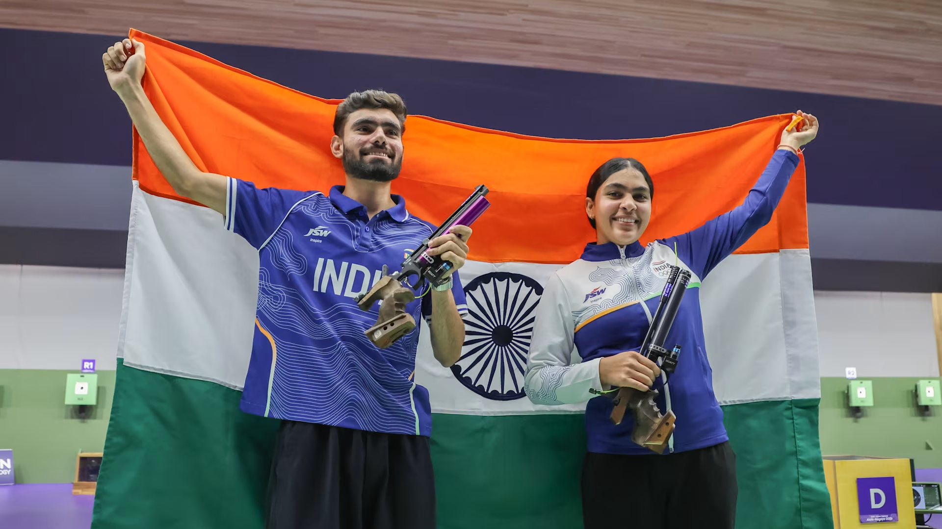 Suruchi Singh and Kamaljeet celebrate after winning the 10m air pistol mixed team gold at the Asian Games 2026