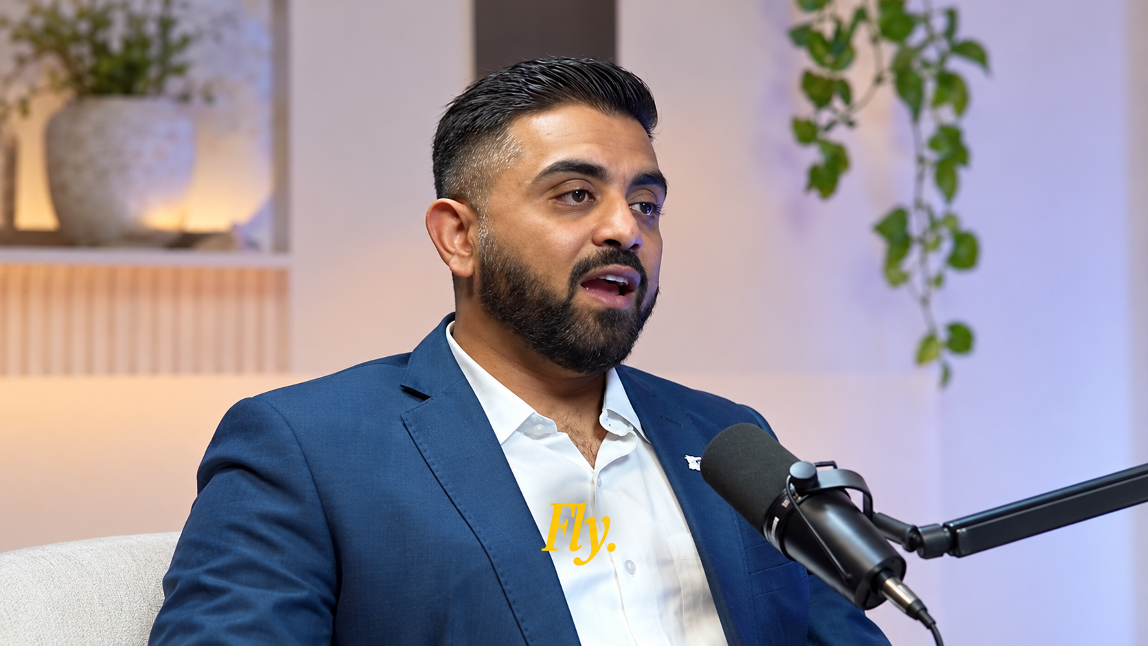 Captain Smit Machchhar speaking into a microphone during an interview